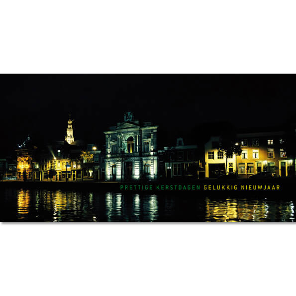 kerstkaart Haarlem, avondopname Teylers museum aan het Spaarne