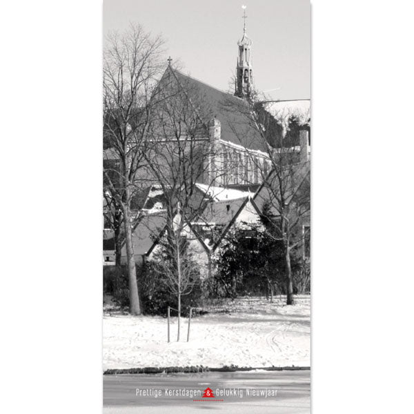 Kerstkaart Alkmaar zwart wit foto Sint-Laurenskerk in sneeuw.