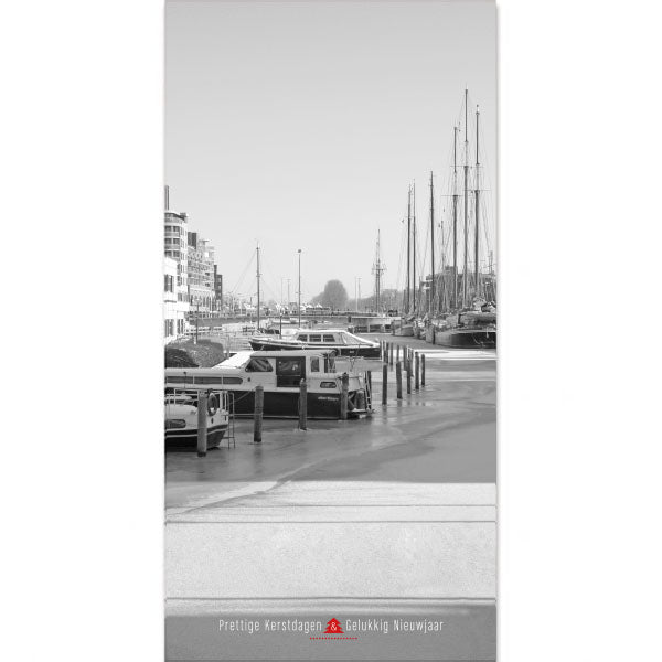 Alkmaarse Kerstkaart met haven in wintertijd.