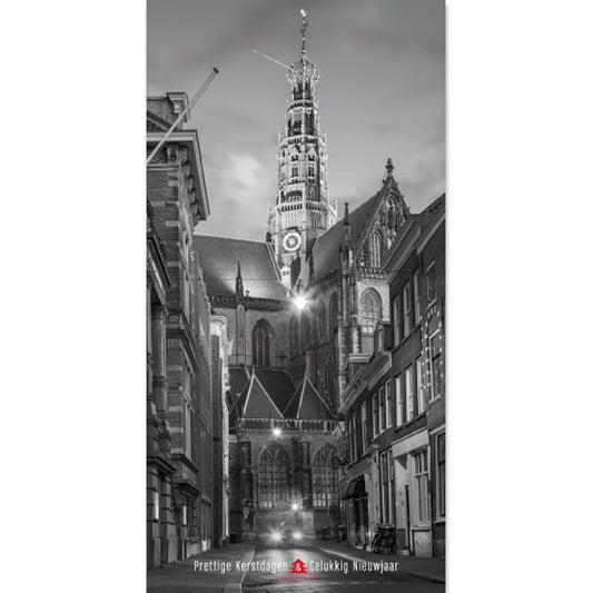 kerstkaart van Haarlem in zwart wit Grote of St. Bavokerk.