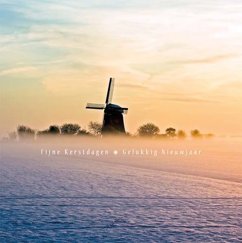 Kerstkaart molen in winterlandschap