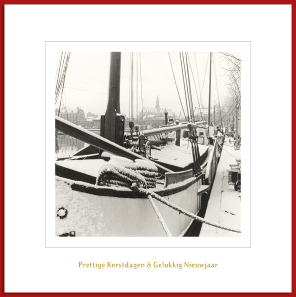 Haarlemse kerstkaart met historische foto van schepen aan het Spaarne.