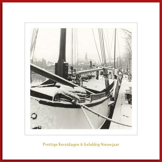 Haarlemse kerstkaart met historische foto van schepen aan het Spaarne.