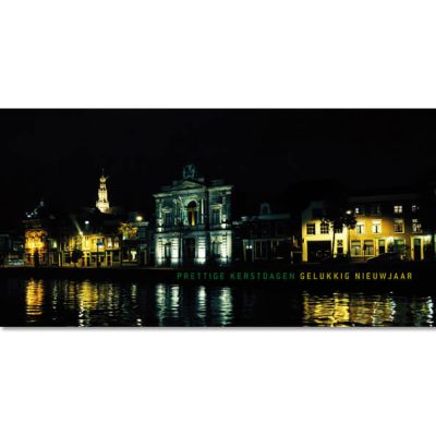 kerstkaart Haarlem, avondopname Teylers museum aan het Spaarne